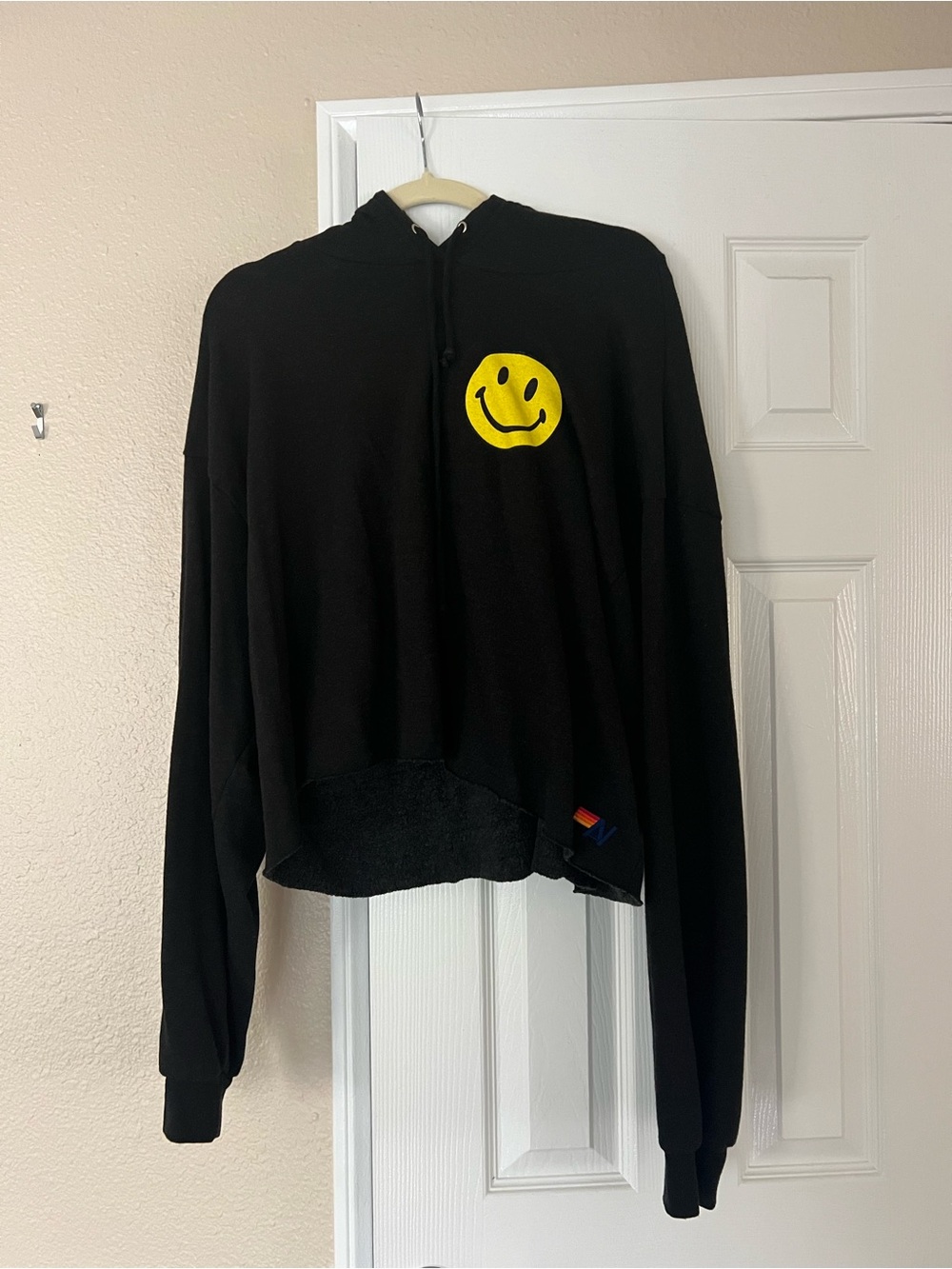 Aviator Nation Black Hoodie Sweater with Yellow Smiley Graphic
